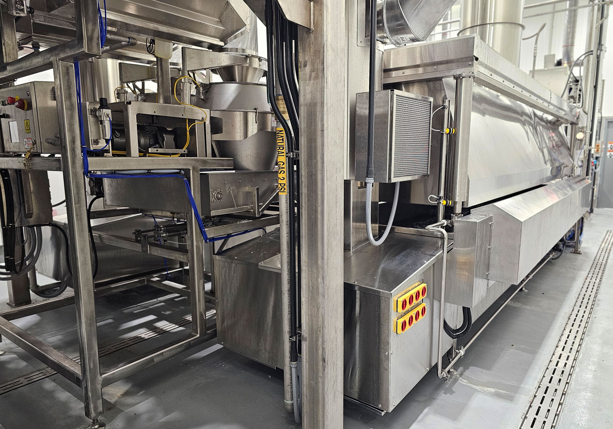 Stainless steel fryer line with raised access platform